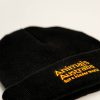 Front of black beanie with the AA logo embroidered in orange